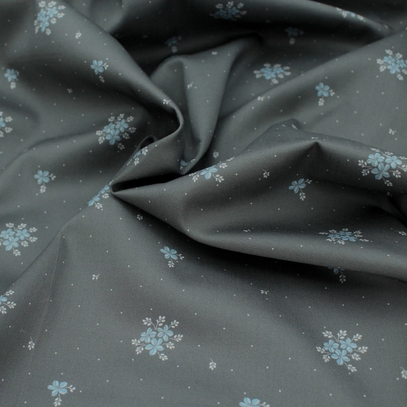 Coton satiné motif Beth exclusif Batikou fond pois gris étain x1m
