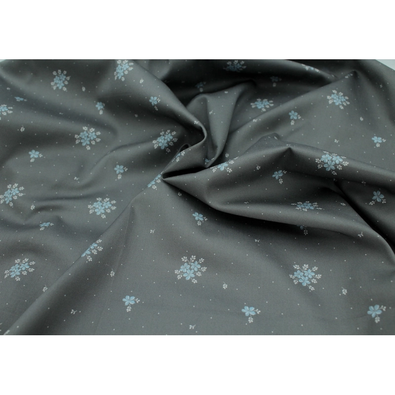 Coton satiné motif Beth exclusif Batikou fond pois gris étain x1m
