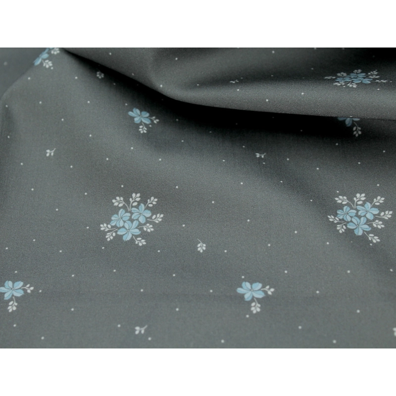 Coton satiné motif Beth exclusif Batikou fond pois gris étain x1m
