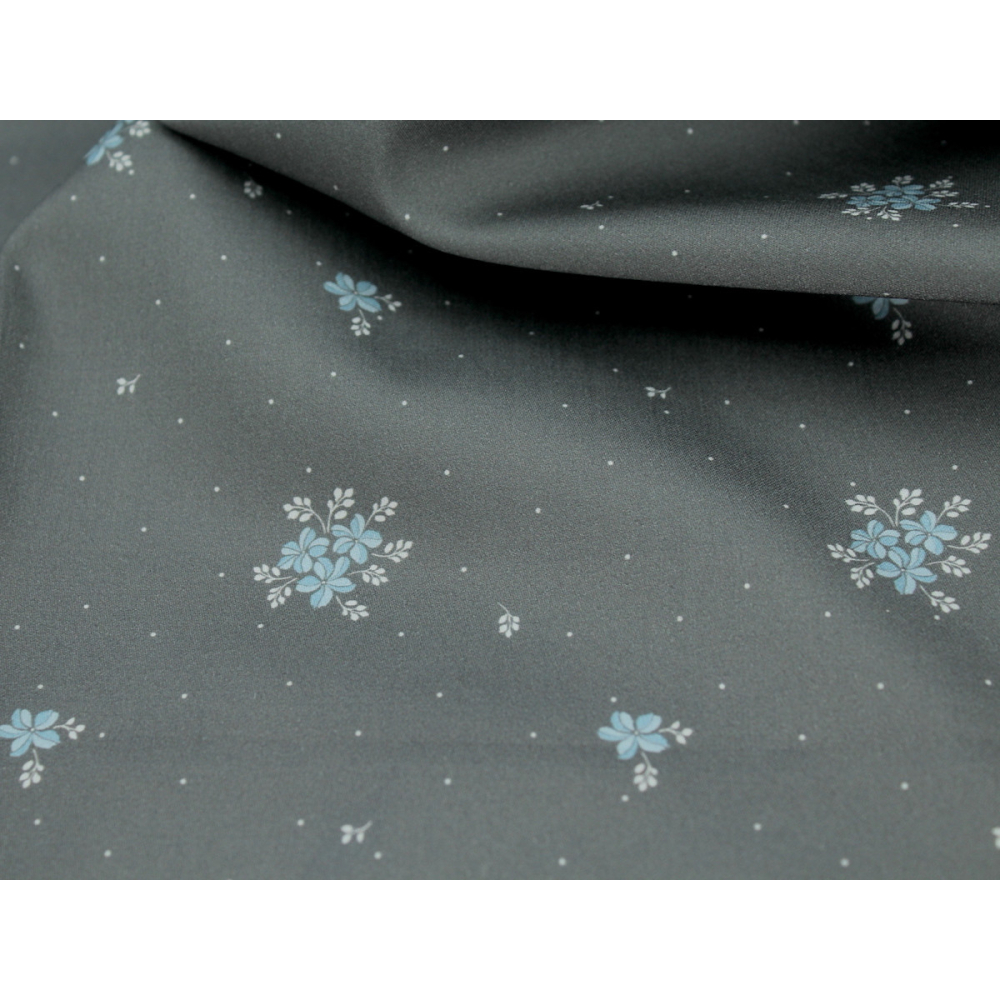 Coton satiné motif Beth exclusif Batikou fond pois gris étain x1m