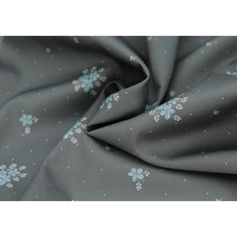 Coton satiné motif Beth exclusif Batikou fond pois gris étain x1m
