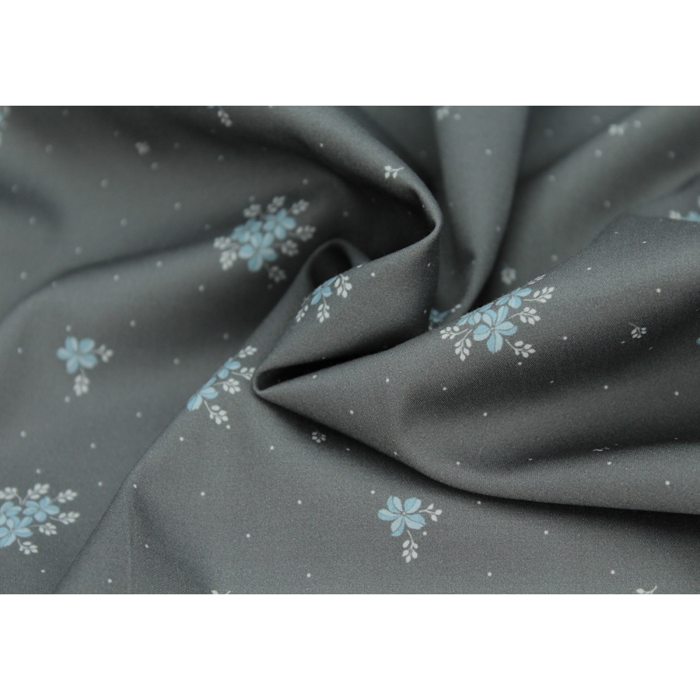 Coton satiné motif Beth exclusif Batikou fond pois gris étain x1m