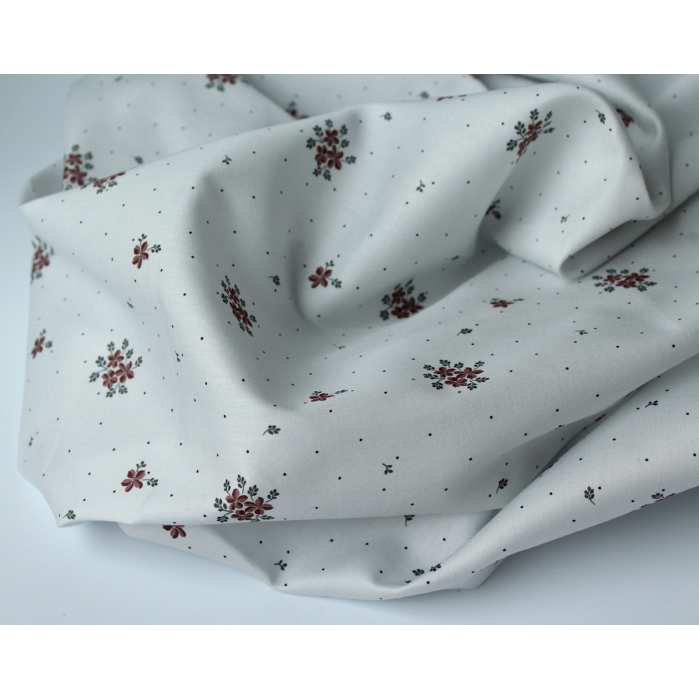 Coton satiné motif Beth exclusif Batikou fond pois gris x1m