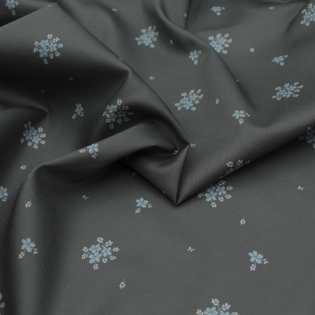 Coton satiné motif Beth exclusif Batikou fond uni gris étain x1m Coton satiné motif Beth exclusif Batikou fond uni gris étain x1m