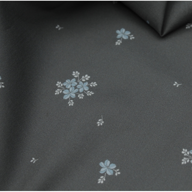 Coton satiné motif Beth exclusif Batikou fond uni gris étain x1m