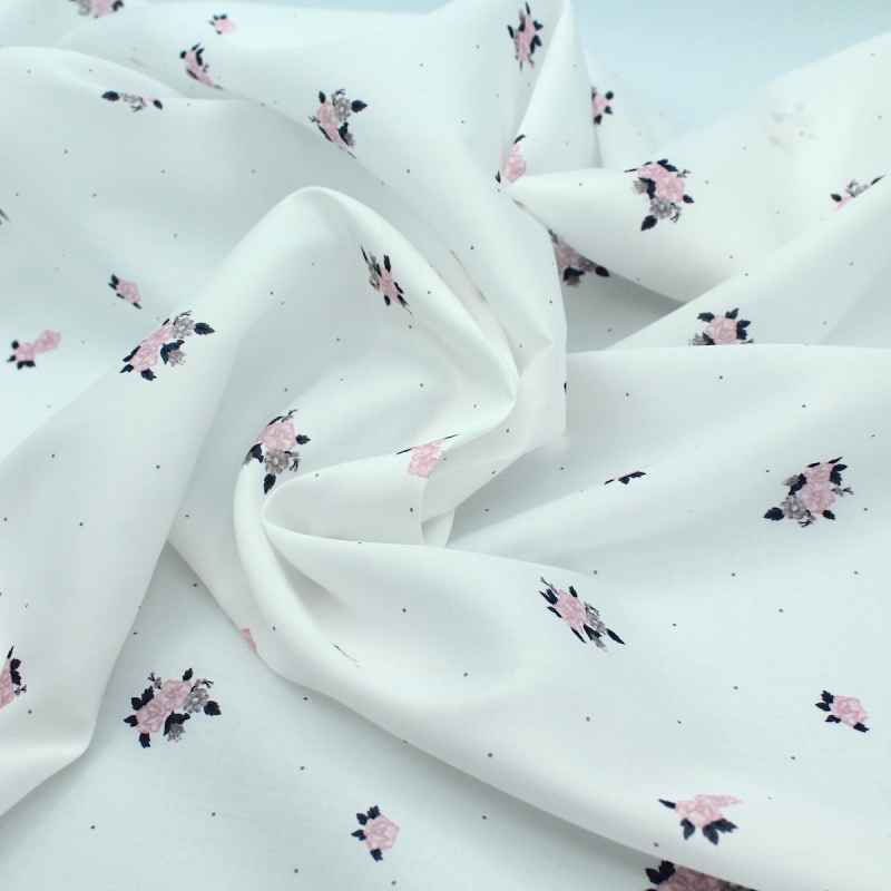 Coton satiné motif Hope exclusif Batikou fond blanc lait x1m