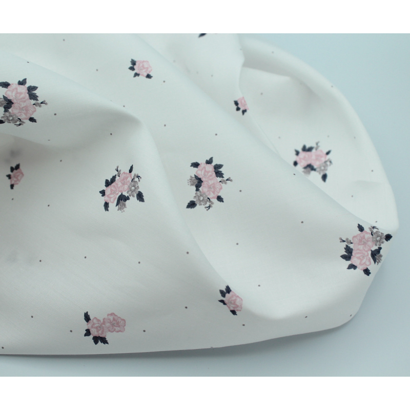 Coton satiné motif Hope exclusif Batikou fond blanc lait x1m