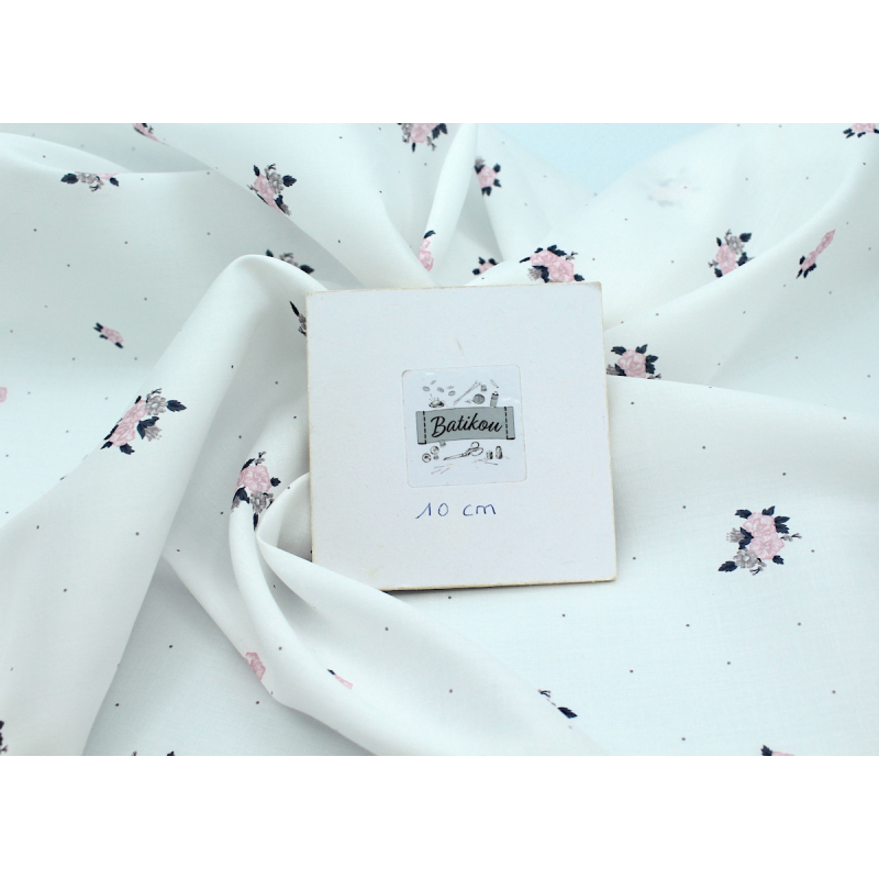 Coton satiné motif Hope exclusif Batikou fond blanc lait x1m