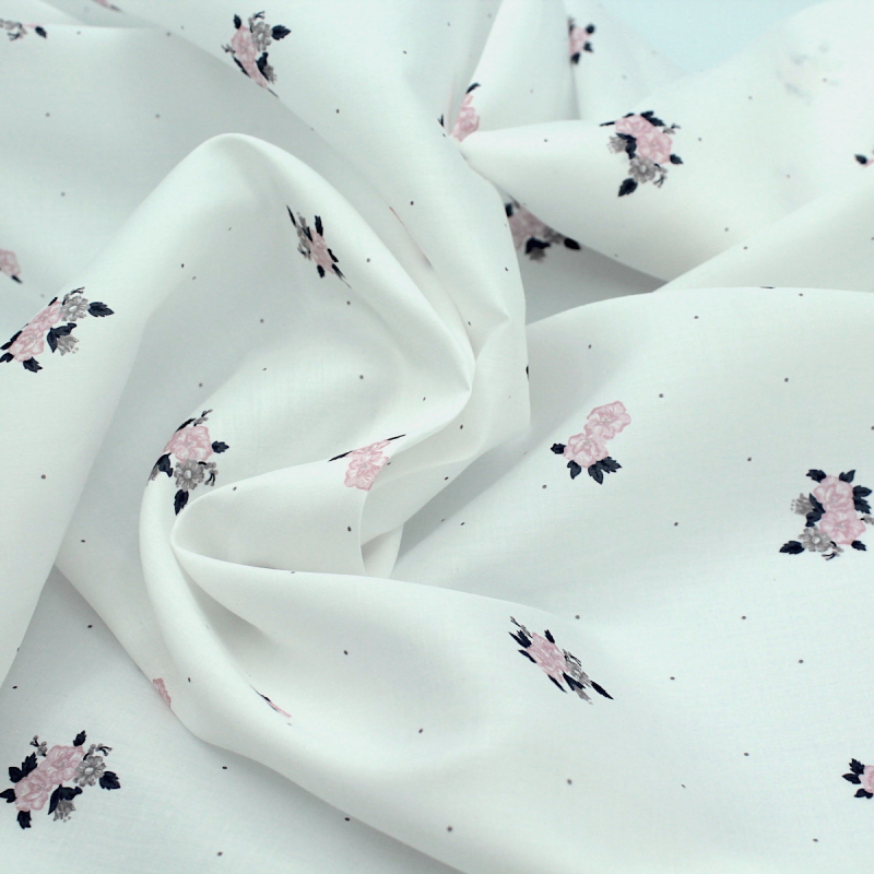 Coton satiné motif Hope exclusif Batikou fond blanc lait x1m