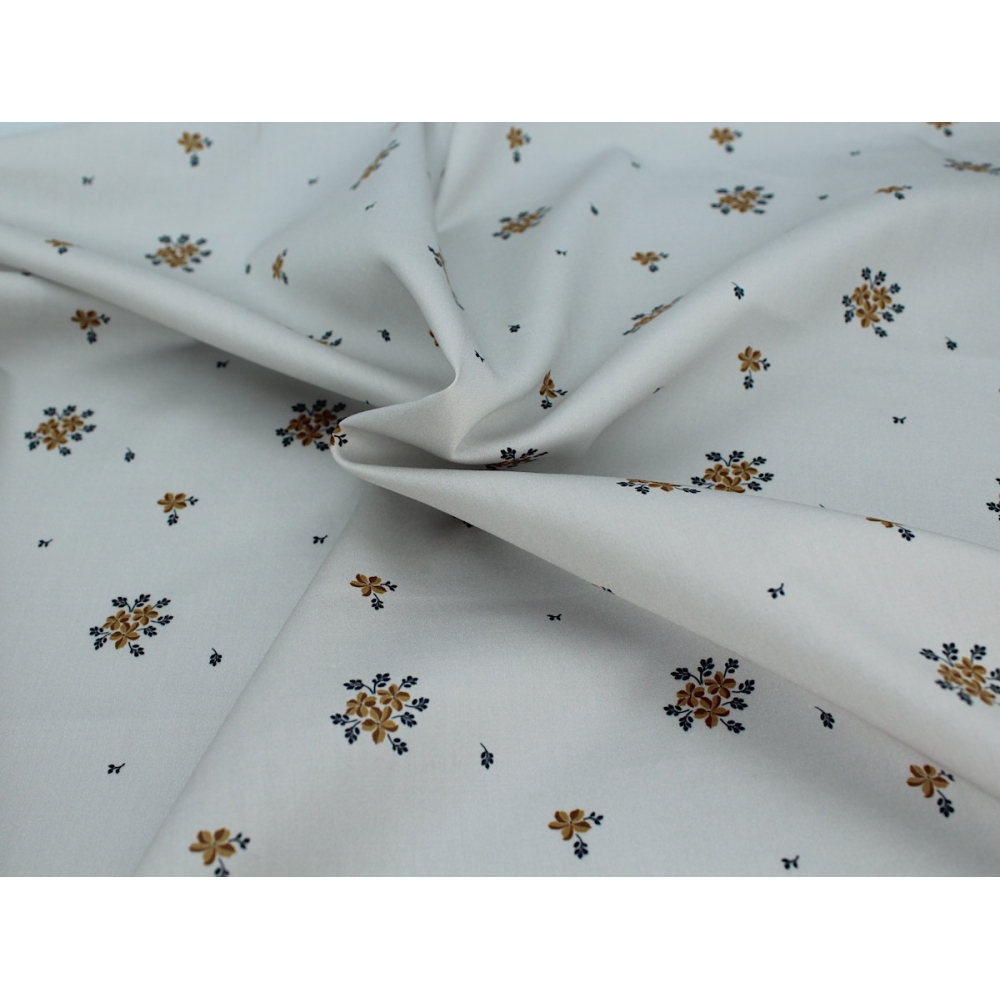 Coton satiné motif Beth exclusif Batikou fond uni gris perle x1m