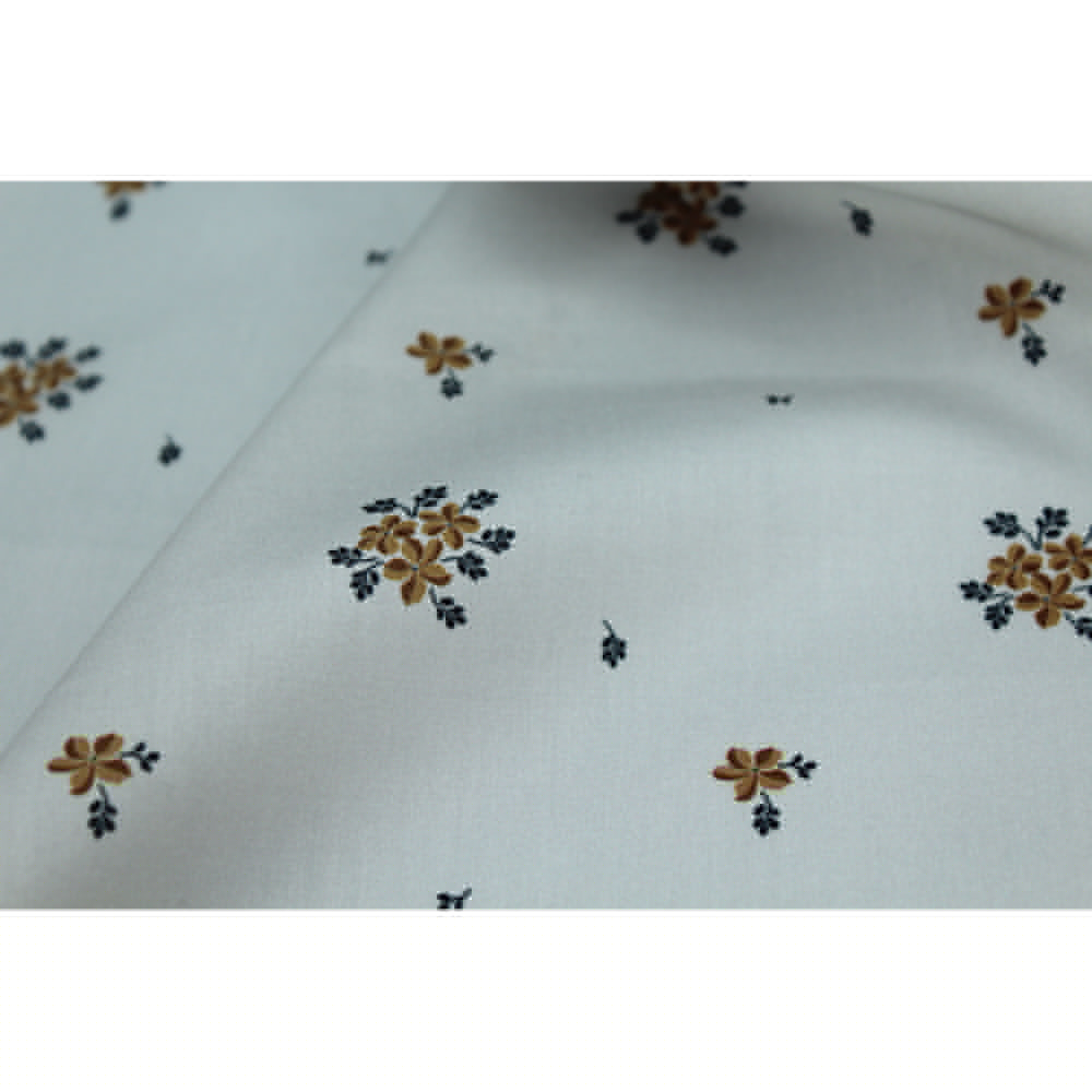 Coton satiné motif Beth exclusif Batikou fond uni gris perle x1m