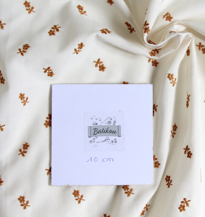 Tissu coton organique broderies fleurs moutarde