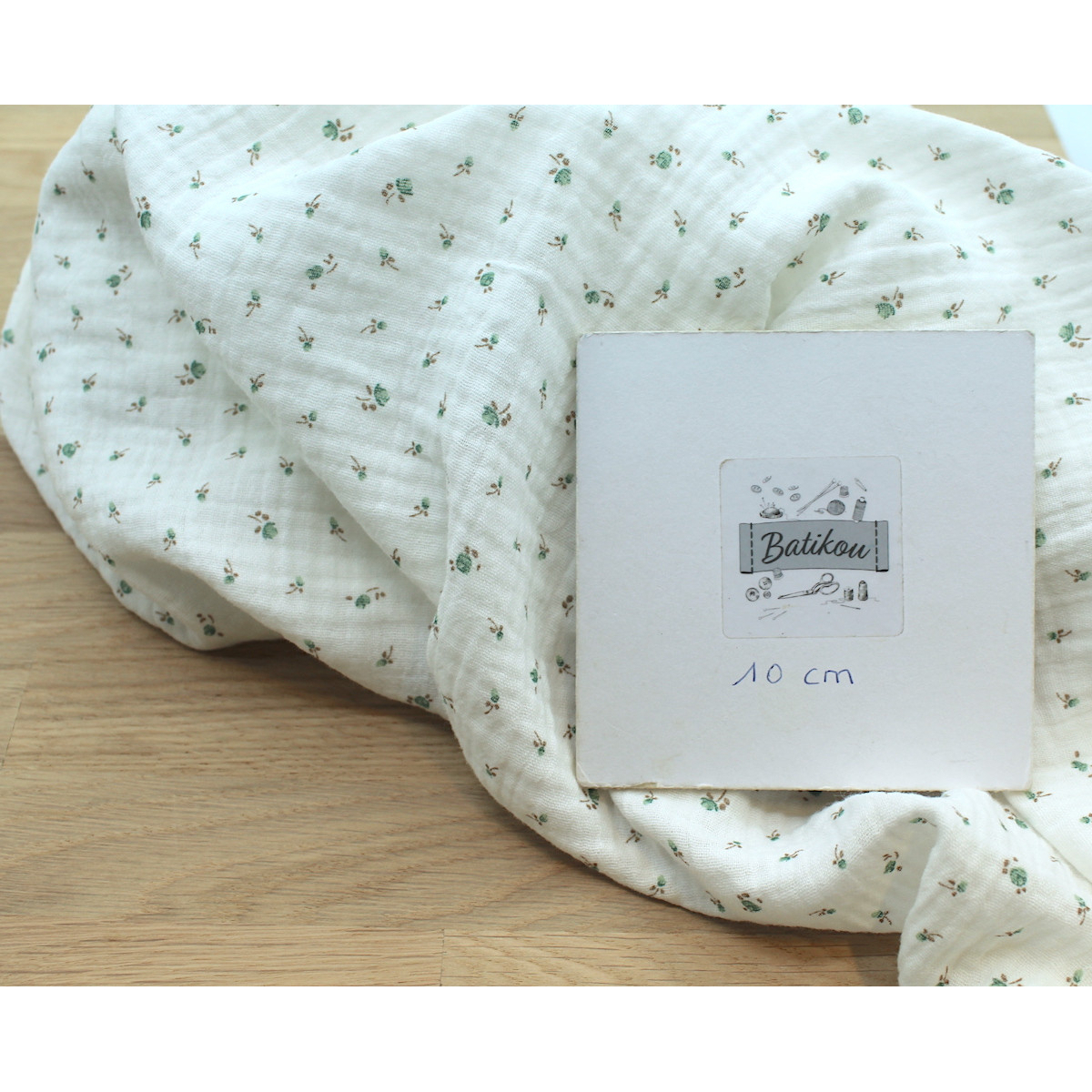 Caroline - Double gaze de coton blanc à motifs petites fleurs Caroline - Double gaze de coton blanc à motifs petites fleurs