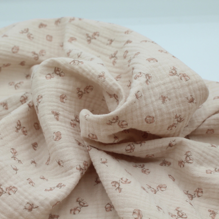 Double gaze de coton coloris nude naturel à motifs fleurs de coton