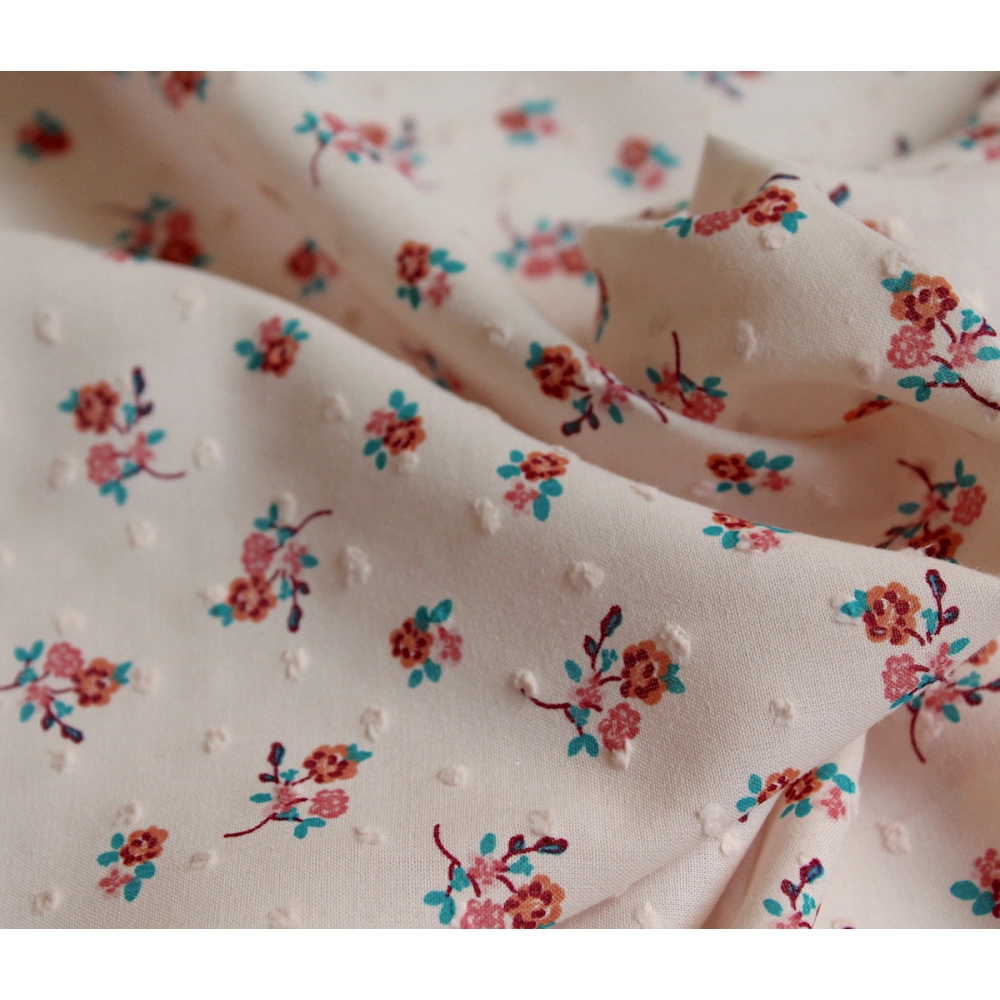 Plumetis de coton imprimé nude