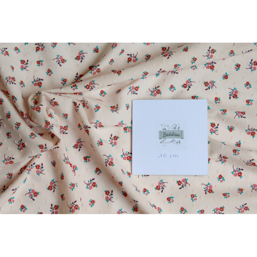 Plumetis de coton imprimé nude