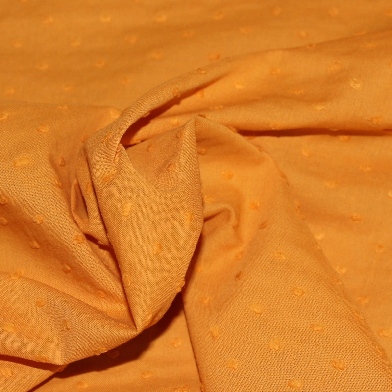 Plumetis de coton coloris clémentine