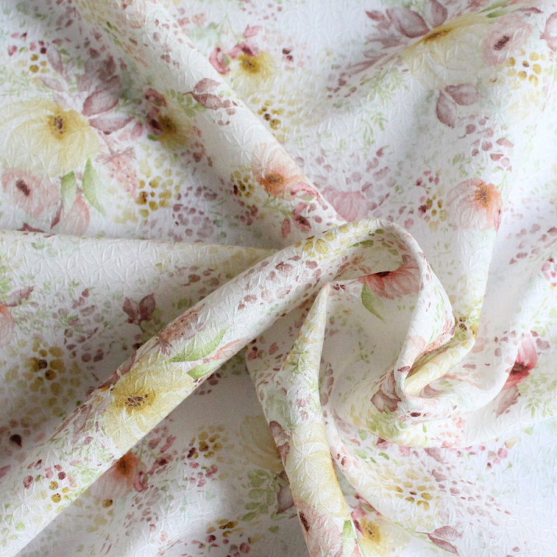 Tissu coton biologique texturé imprimé fleuri aquarelle