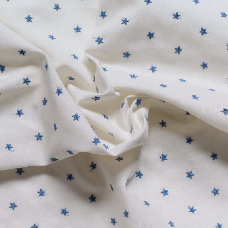 Tissu coton organique broderies fleurs bleu