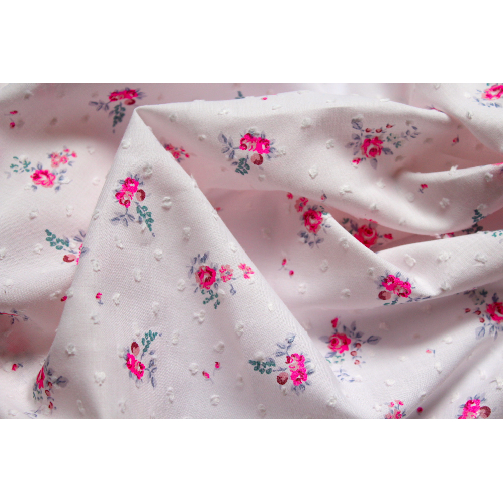 Plumetis de coton imprimé rose