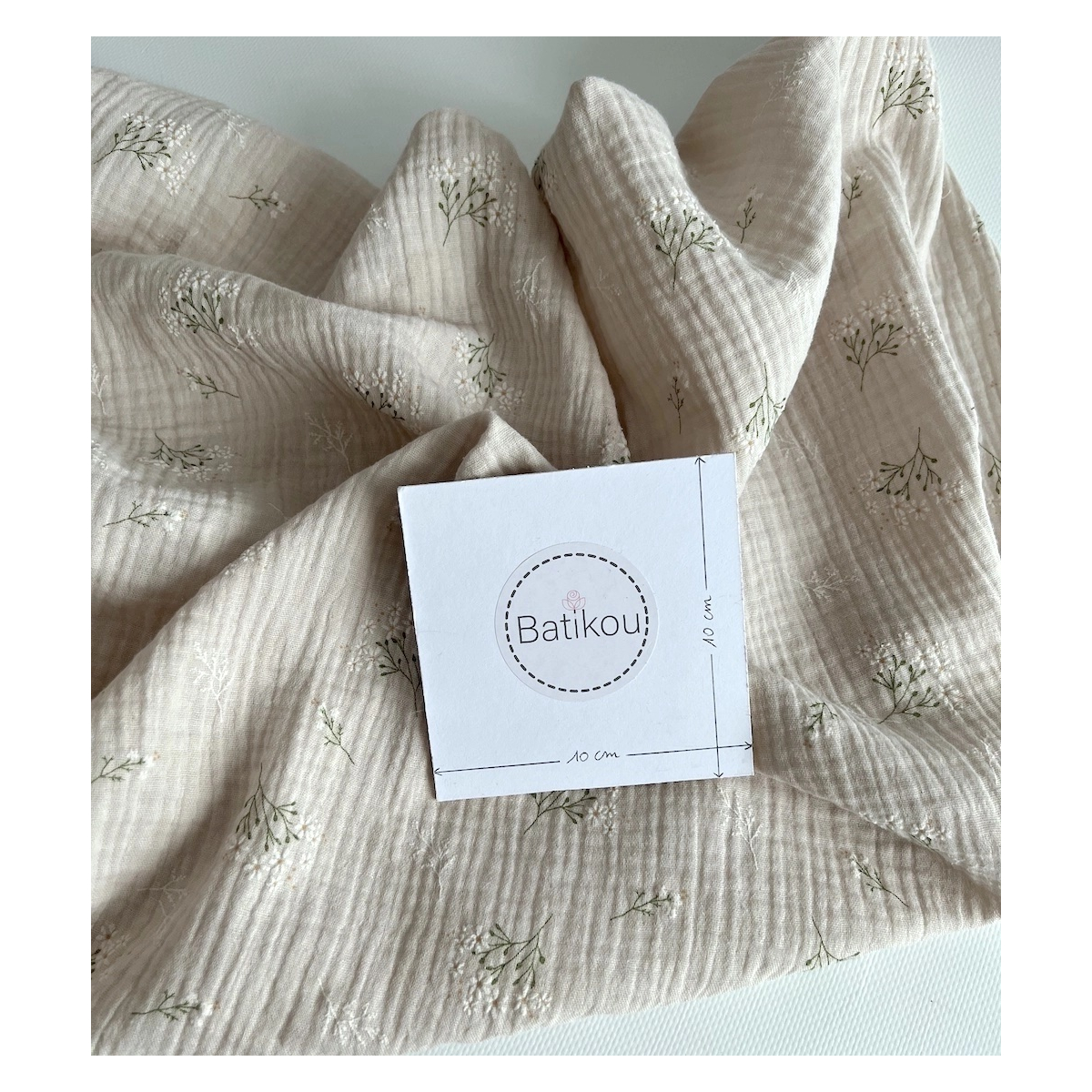 Camomille - Double gaze de coton BIO crème motif exclusif Camomille - Double gaze de coton BIO crème motif exclusif
