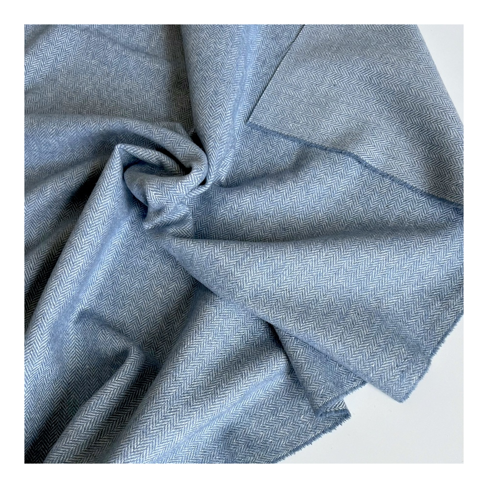 Tissu chevrons texturé coton / laine coloris bleu jean