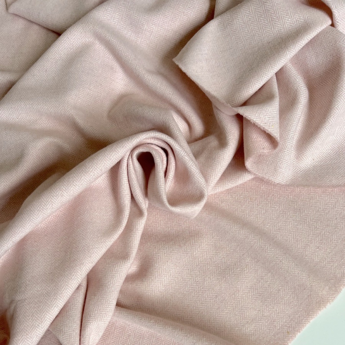Tissu chevrons texturé coton / laine coloris rose poudré