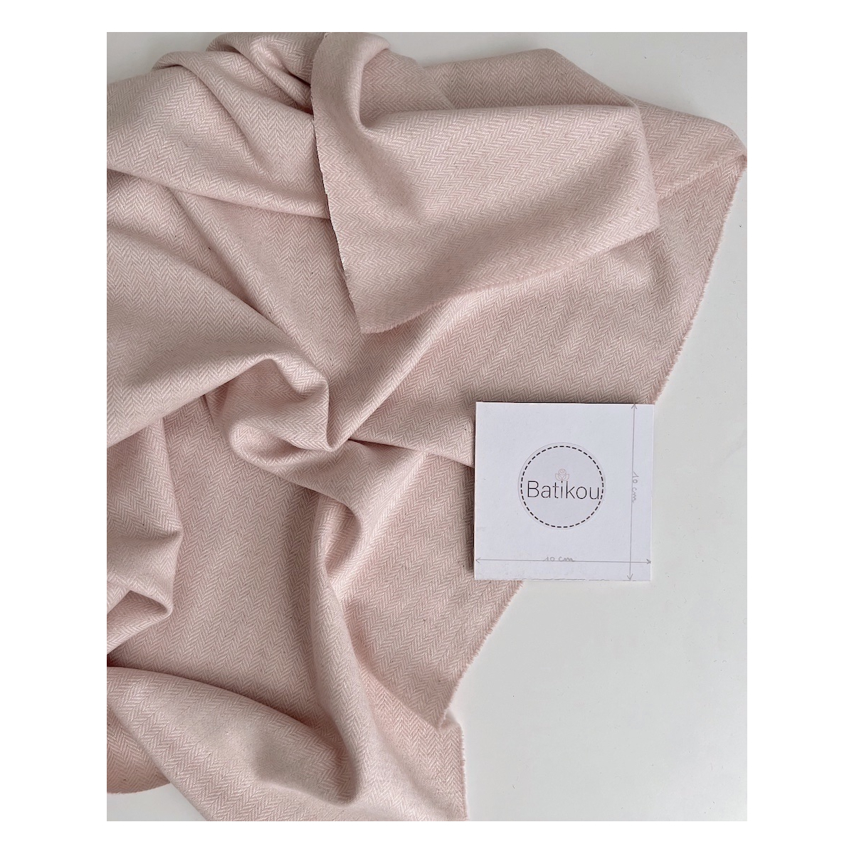 Tissu chevrons texturé coton / laine coloris rose poudré Tissu chevrons texturé coton / laine coloris rose poudré