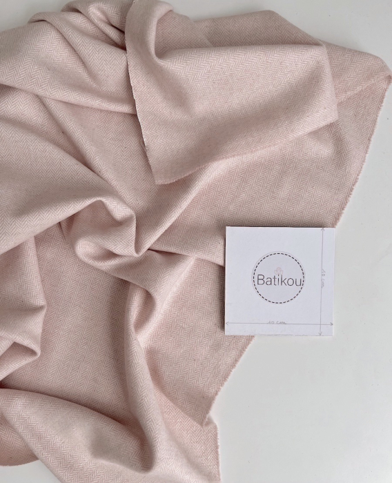 Tissu chevrons texturé coton / laine coloris rose poudré