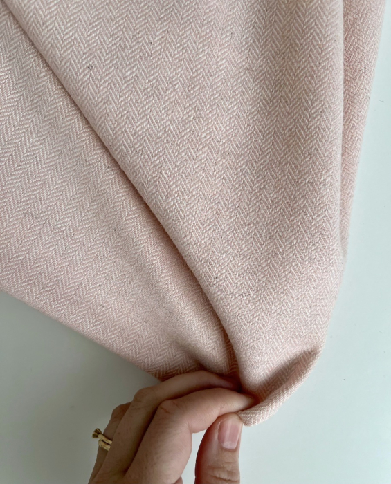 Tissu chevrons texturé coton / laine coloris rose poudré