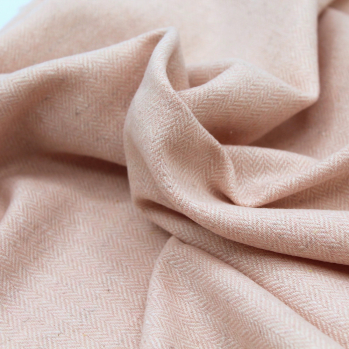 Tissu chevrons texturé coton / laine coloris rose poudré