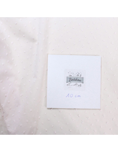 Plumetis de coton coloris rose poudré