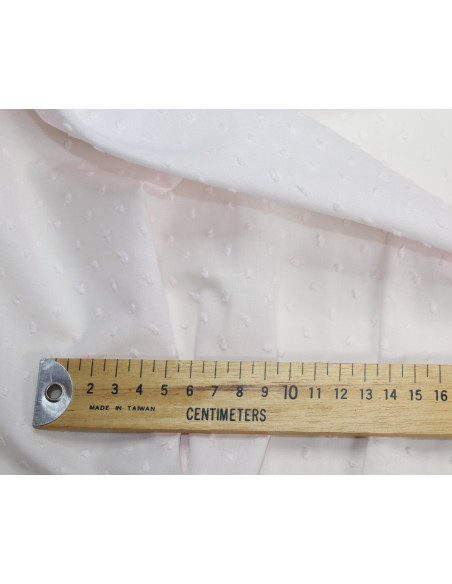 Plumetis de coton coloris rose poudré