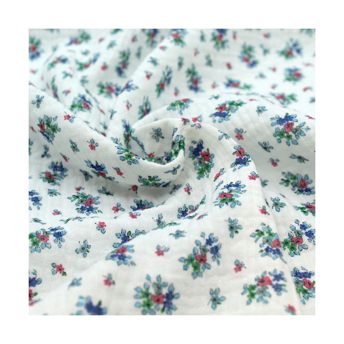 Lisette - Double gaze de coton blanc cassé à motifs petites fleurs bleues Tissus issus de l'agriculture biologique  - 1 Lisette - Double gaze de coton blanc cassé à motifs petites fleurs bleues Tissus issus de l'agriculture biologique  - 1
