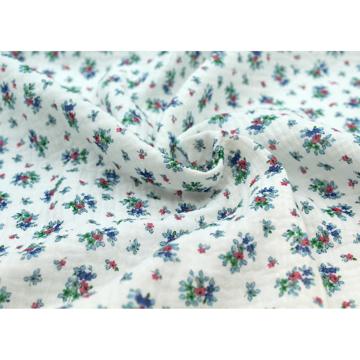 Lisette - Double gaze de coton blanc cassé à motifs petites fleurs bleues Tissus issus de l'agriculture biologique  - 4 Lisette - Double gaze de coton blanc cassé à motifs petites fleurs bleues Tissus issus de l'agriculture biologique  - 4