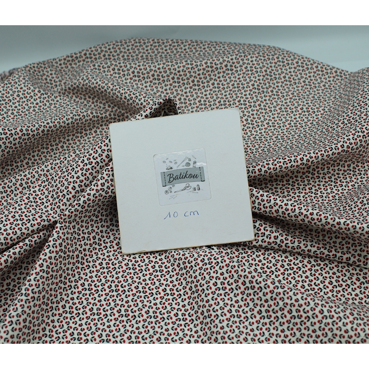 Popeline fine et douce coton organique fond ivoire imprimé mini fleurs