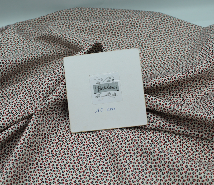 Popeline fine et douce coton organique fond ivoire imprimé mini fleurs