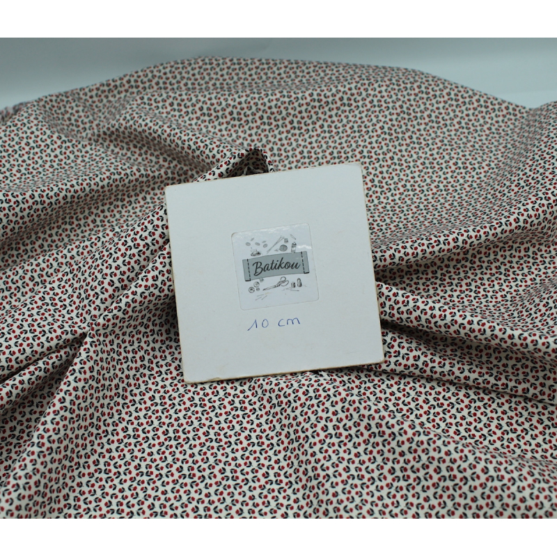 Popeline fine et douce coton organique fond ivoire imprimé mini fleurs