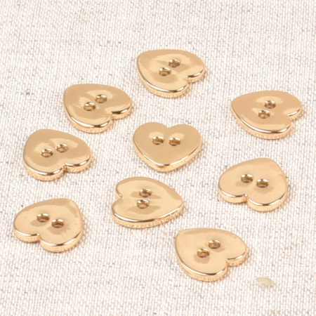 Bouton à coudre coeur en métal doré 10x12mm Batikou - 1 Bouton à coudre coeur en métal doré 10x12mm Batikou - 1