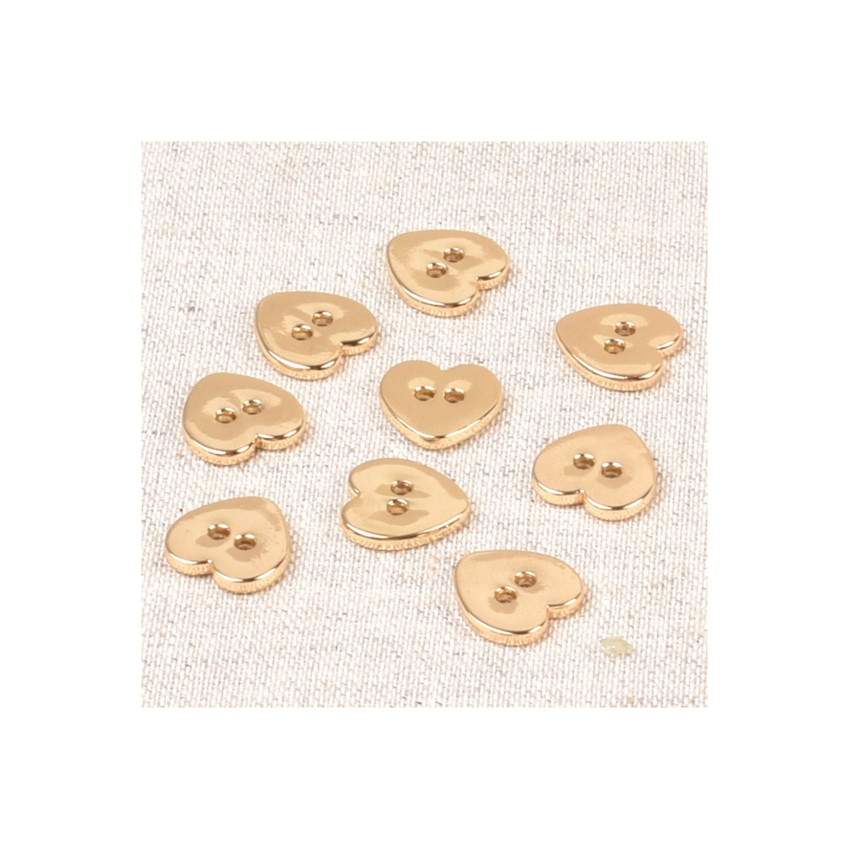 Bouton à coudre coeur en métal doré 10x12mm Batikou - 1 Bouton à coudre coeur en métal doré 10x12mm Batikou - 1