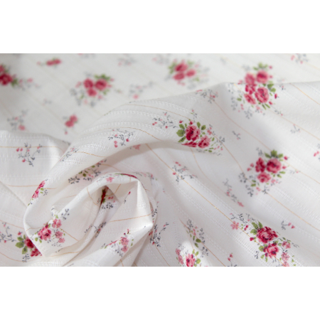 Tissu coton texturé / jacquard fleuri rose et lurex Tissu coton texturé / jacquard fleuri rose et lurex