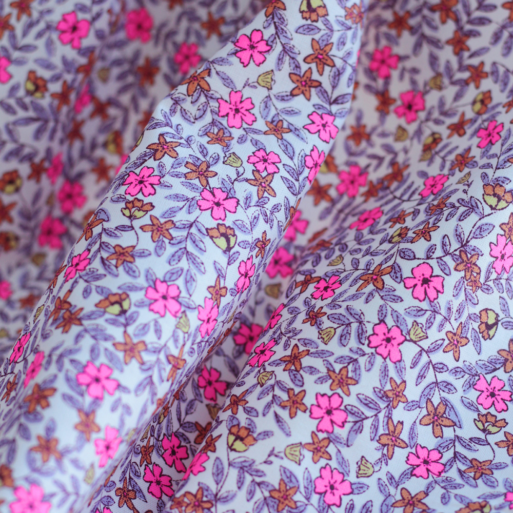 Méline - Popeline de coton BIO imprimé fleurs rose fluo Tissus issus de l'agriculture biologique  - 1
