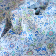 Léona - Plumetis de coton parme imprimé fleuri teintes bleues Tissus issus de l'agriculture biologique  - 1
