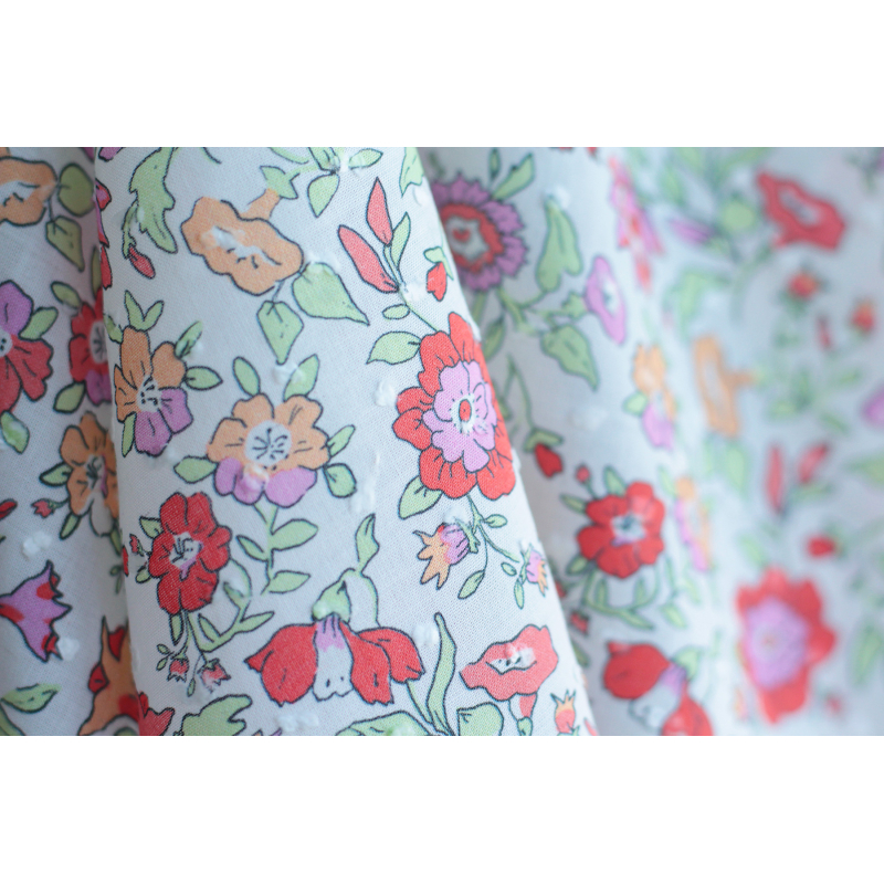 Léona - Plumetis de coton parme imprimé fleuri rouge orangé Tissus issus de l'agriculture biologique  - 11