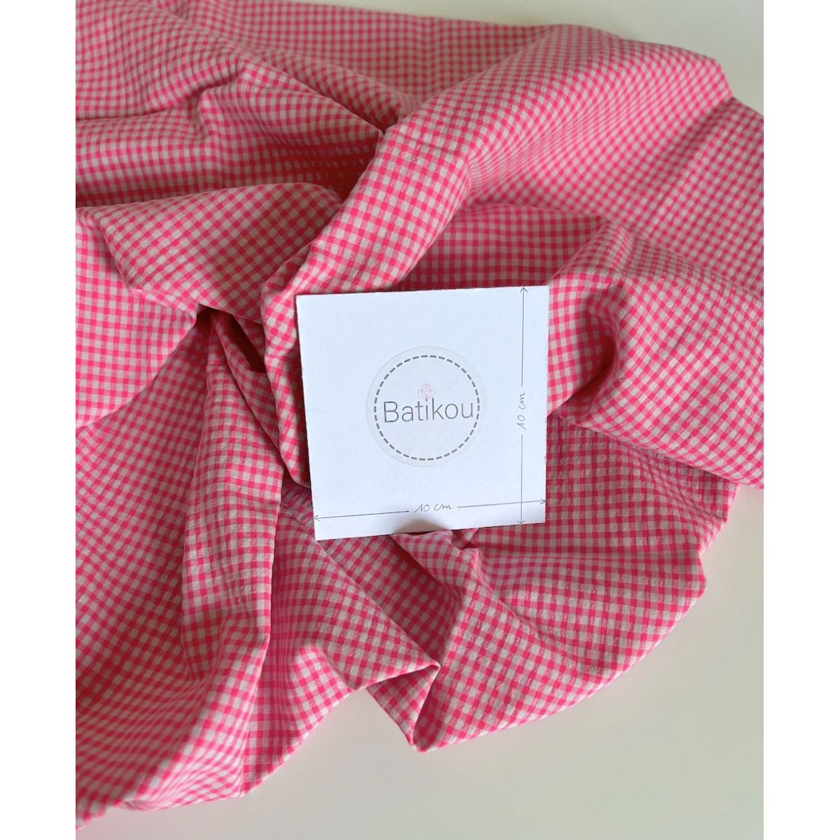 Seersucker / Coton gaufré vichy 3mm mini rose fluo Seersucker / Coton gaufré vichy 3mm mini rose fluo