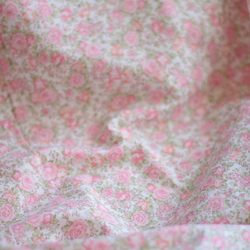 Abigael - Popeline de coton BIO imprimé fleurs rose fluo