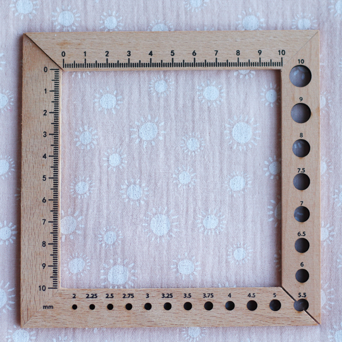 Solea - Double gaze de coton coloris fond rose nude motif soleil