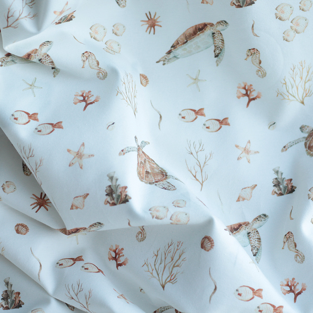 Jersey coton à motifs tortues ocre