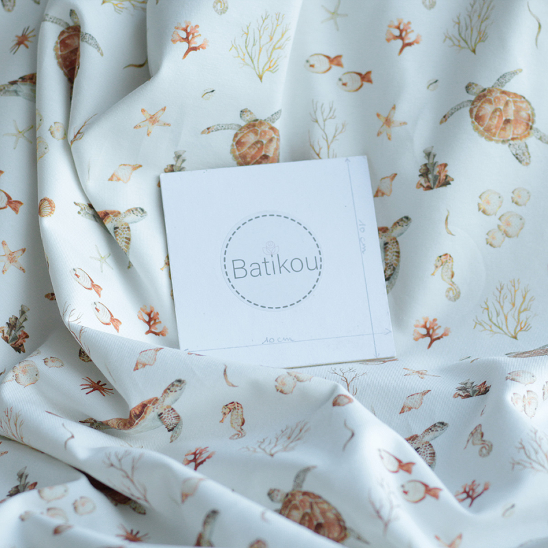 Jersey coton à motifs tortues ocre