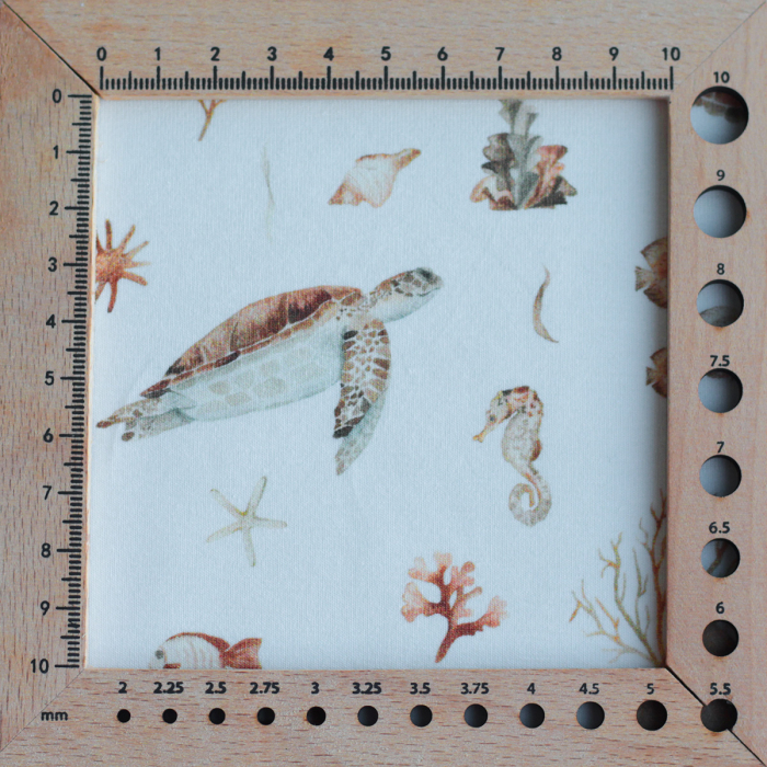 Jersey coton à motifs tortues ocre